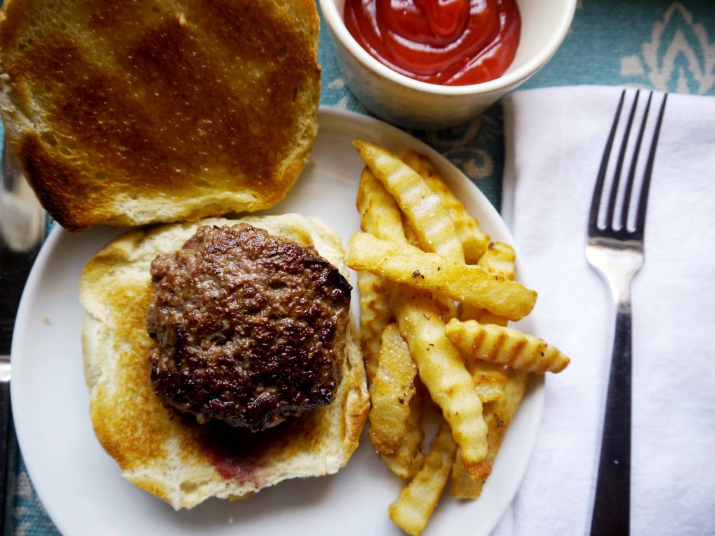A hamburger and french fries.