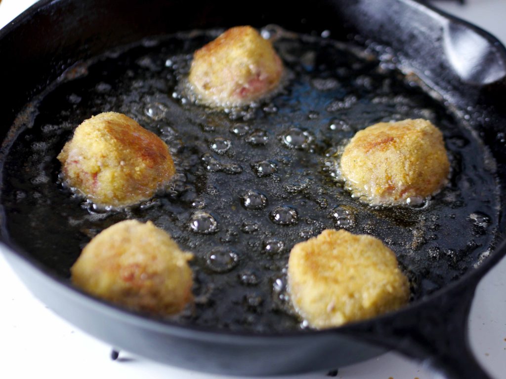 Meatballs frying