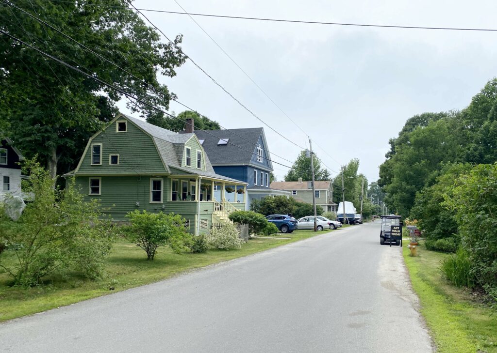 Side of the house on a quiet street.